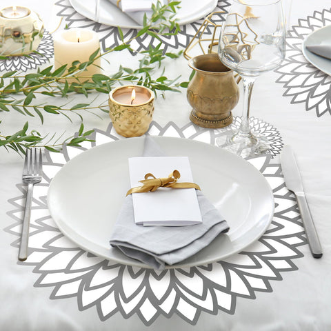 Geosar silver metallic coasters provide surface protection and quick cleanup after meals.