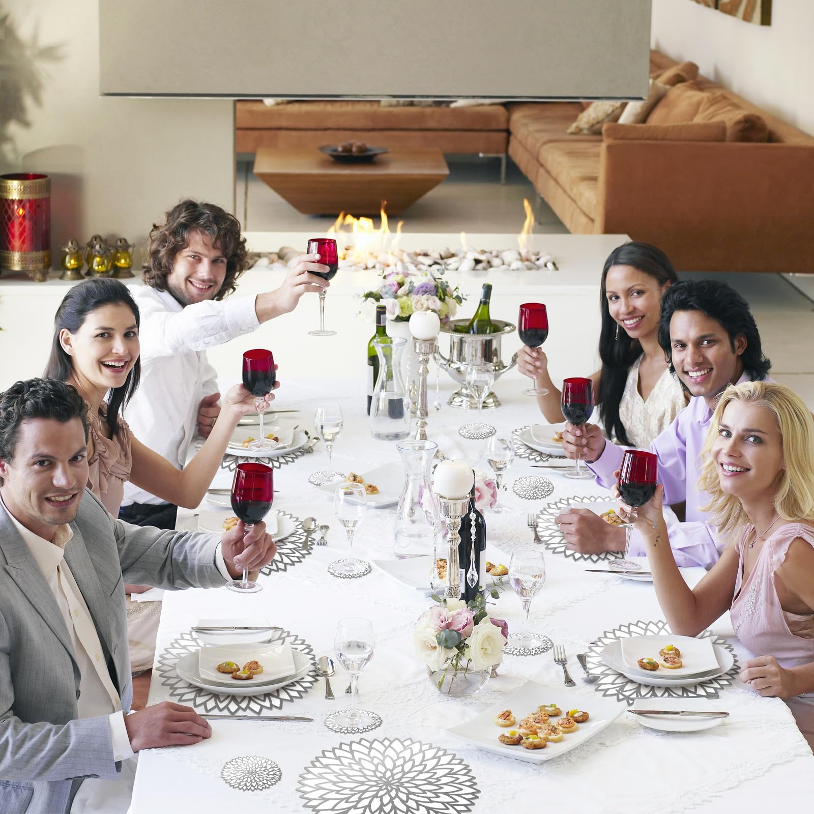 Geosar indoor outdoor dining setup with silver placemats and coasters.