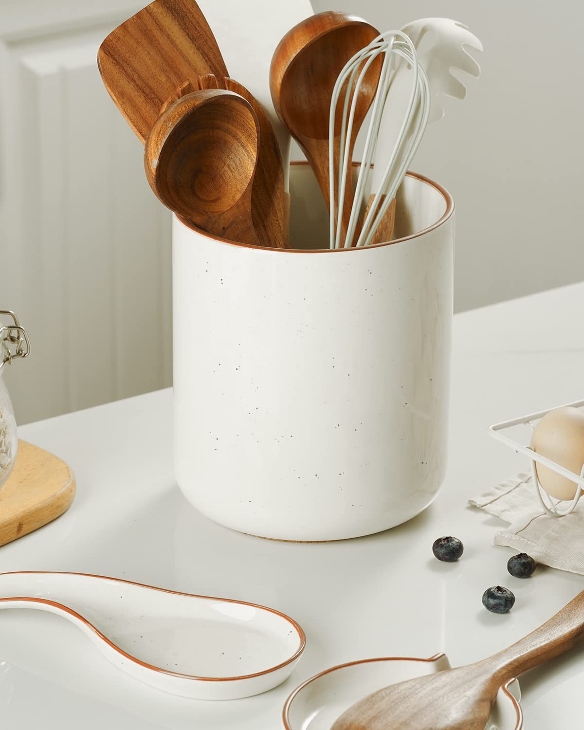 Getstar utensil holder features decorative dots and matte chocolate rim to enhance modern counters.