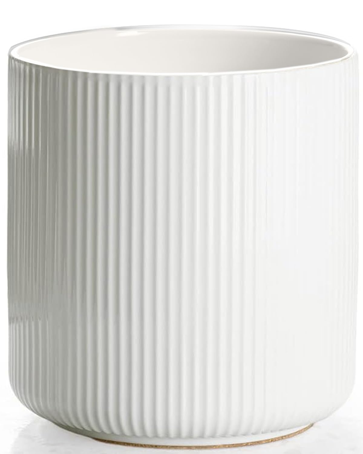 Getstar large ceramic utensil holder on the counter keeps spatulas organized.
