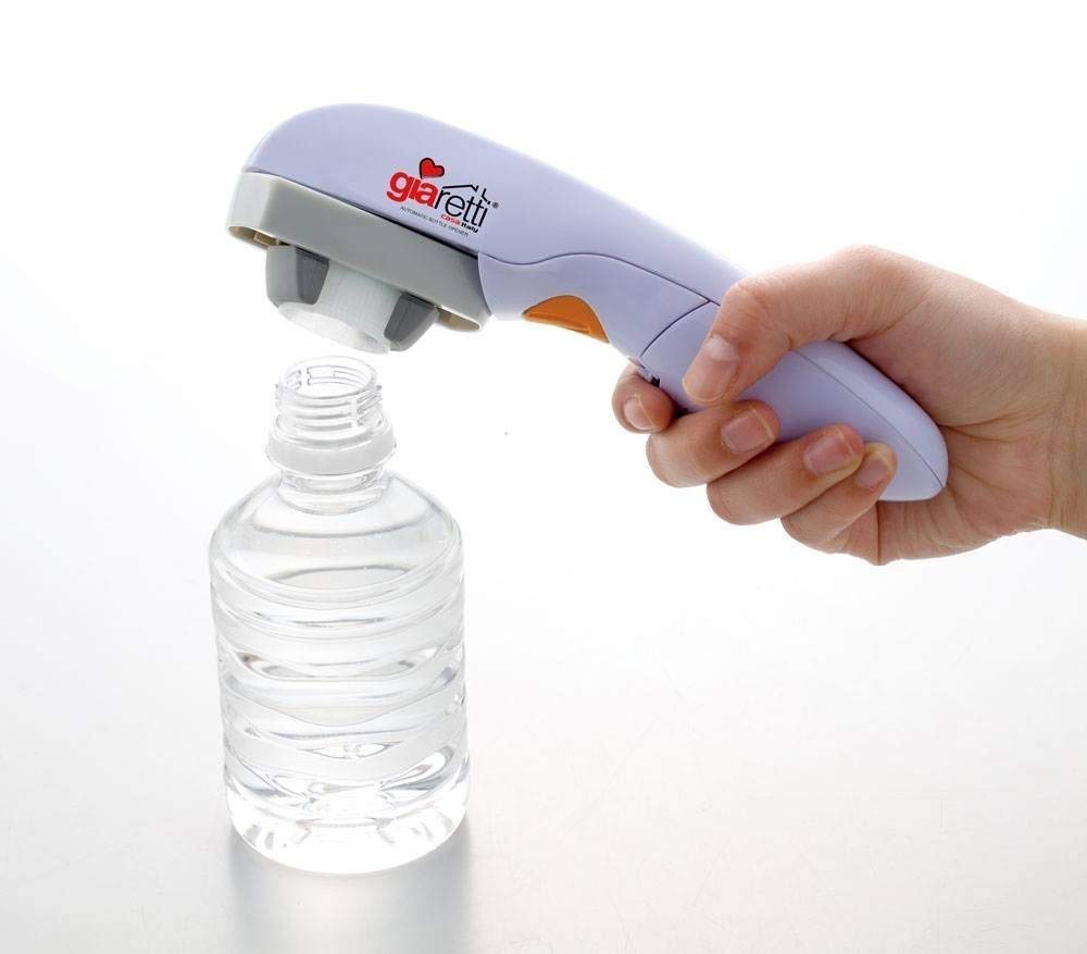 Giaretti LA CASA automatic bottle opener in use, aiding easy cap removal for seniors with weak grip.