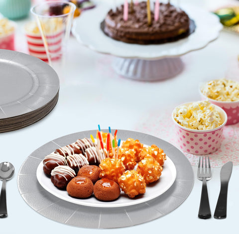 Gift Boutique wedding table decor with silver charger plates for sophisticated events.