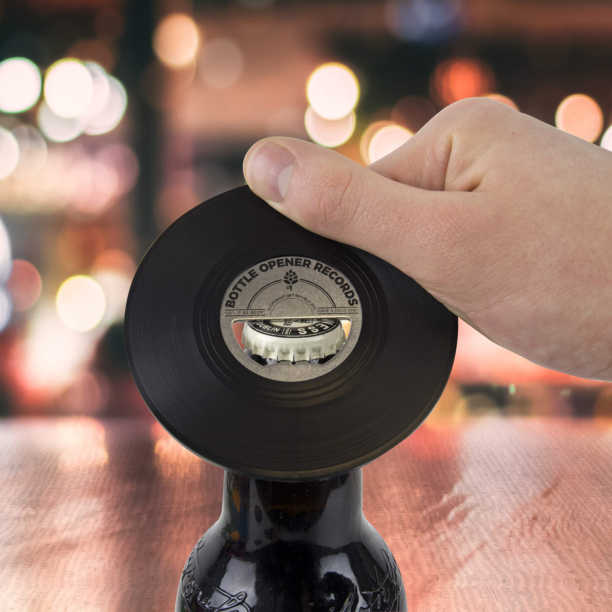 Gift Republic vinyl bottle opener in use, perfect for casual gatherings