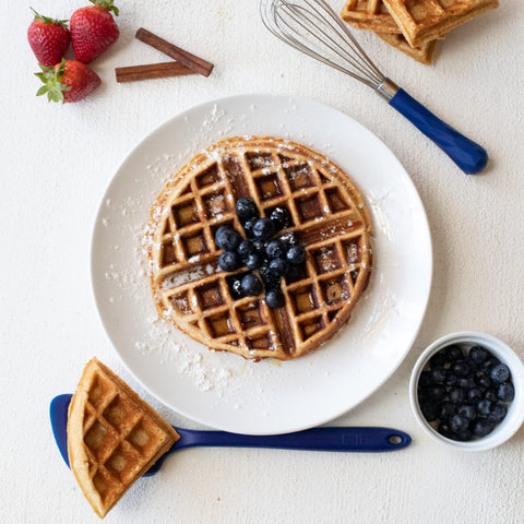 GIR Premium Ultimate Silicone Spatula Turner on nonstick cookware, protecting coatings during flipping.