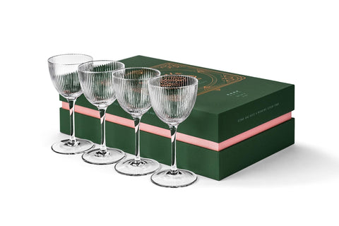 GLASSIQUE CADEAU handblown crystal glassware adds artisanal charm.