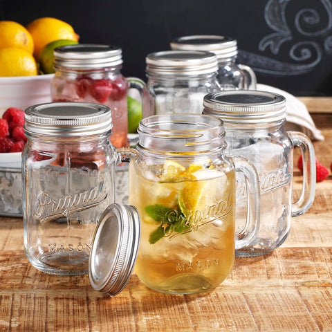 Glaver's 16oz mason jar with handle and lid on table, ideal for casual gatherings.