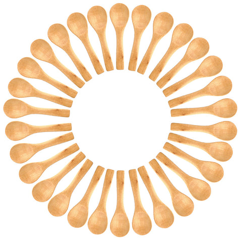 Gleihow small wooden spoons arranged for display, ideal for spices, dips, or scrubs.