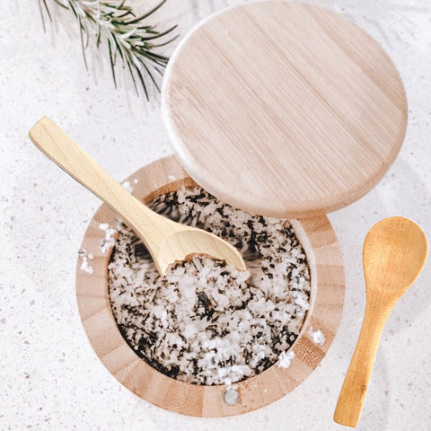 Gleihow small wooden spoons with sugar scrub setup conveys pampering body care vibe.