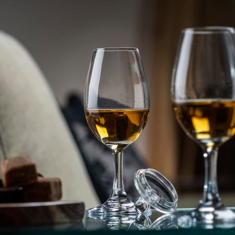 Glencairn tasting cap traps vapors to intensify aromas