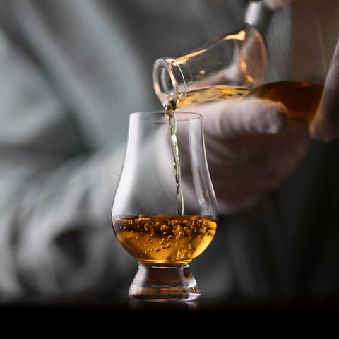 Glencairn whiskey glass tapered mouth concentrates aromas for a richer nose.