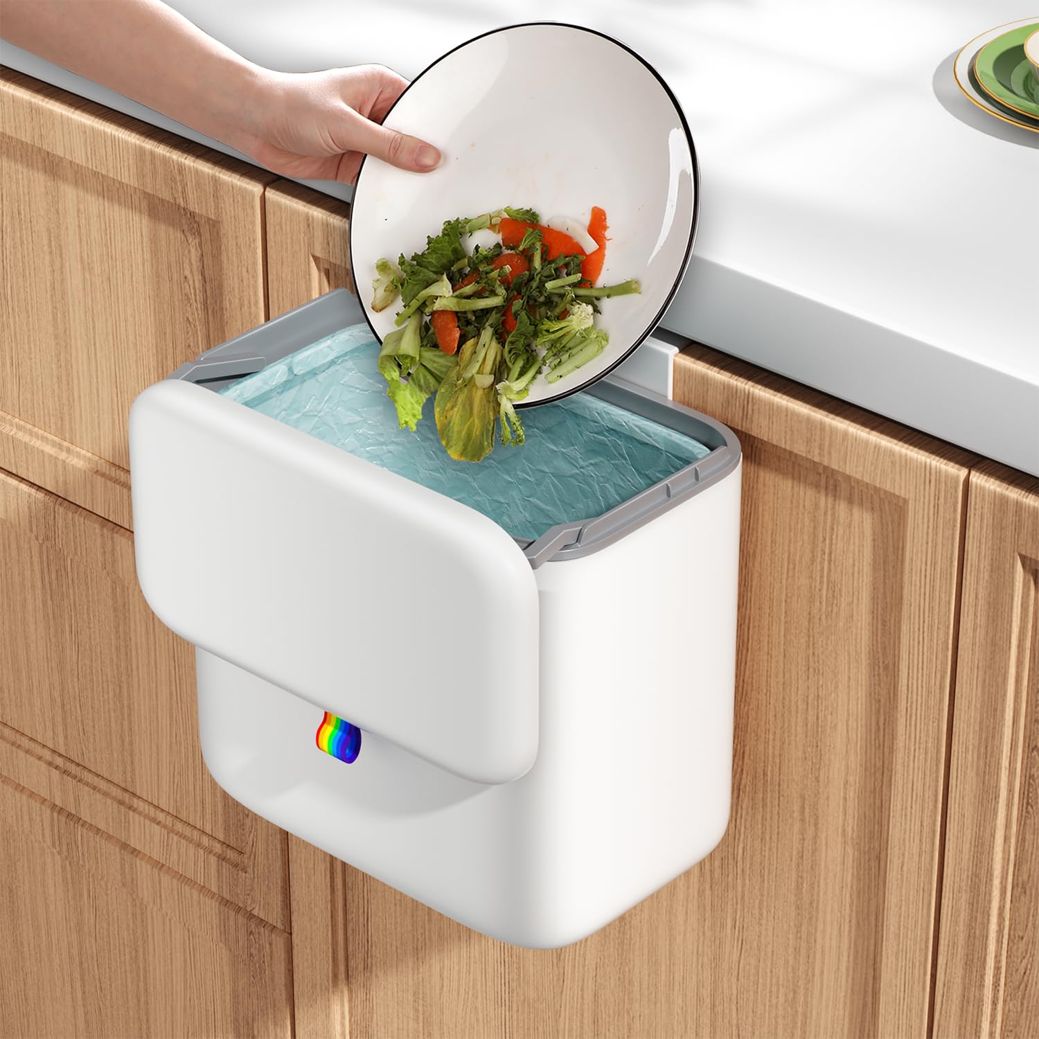 Gleynest compost bin on countertop with lid for odor control.