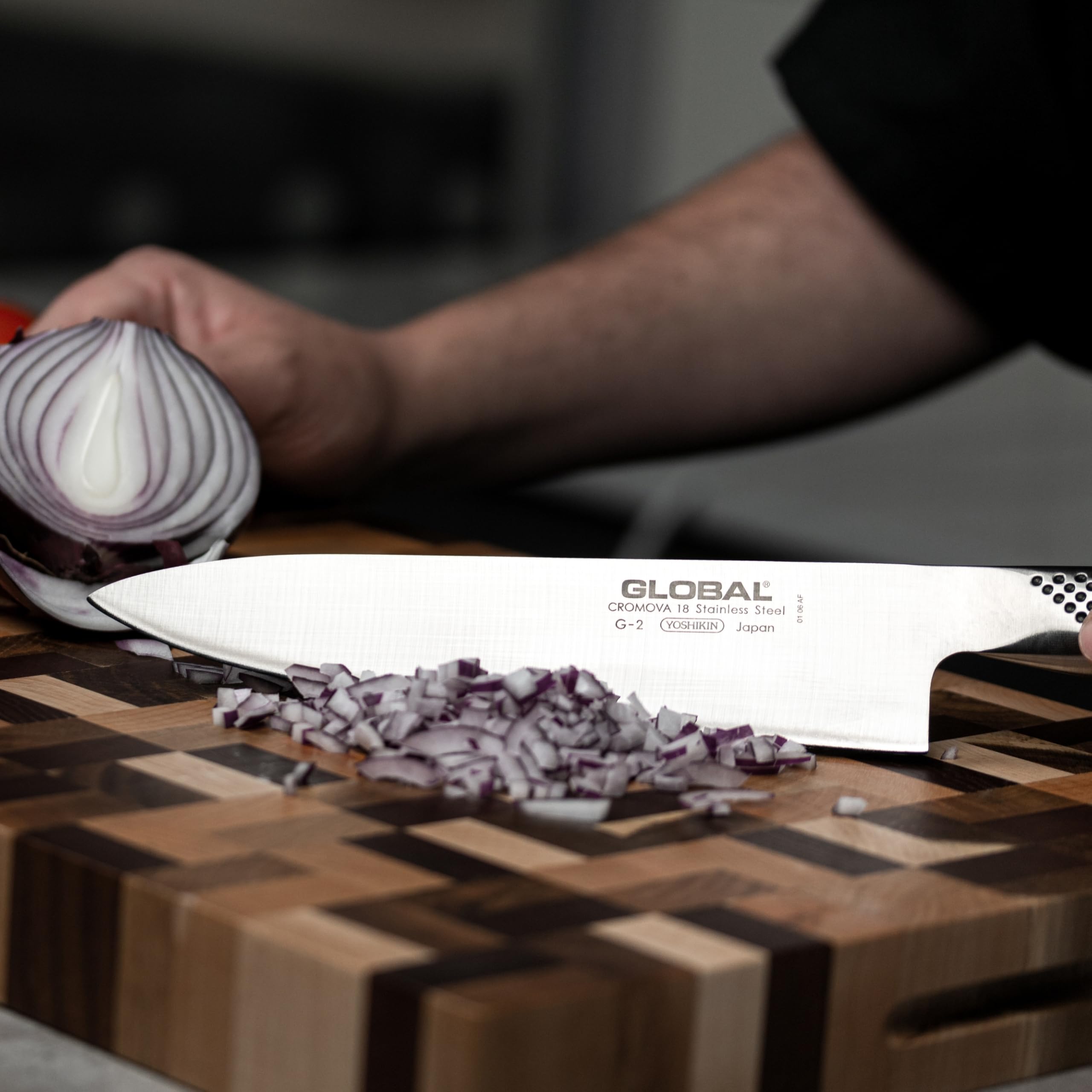 Global 8-inch knife edge detail highlights its face-ground precision
