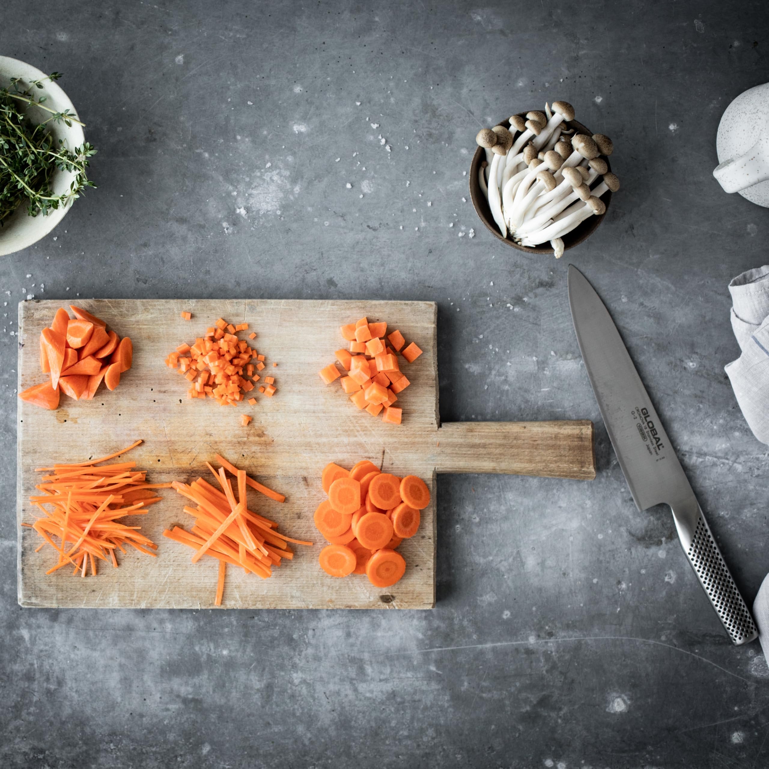 Global 8-inch knife finger notch provides safety between blade and handle