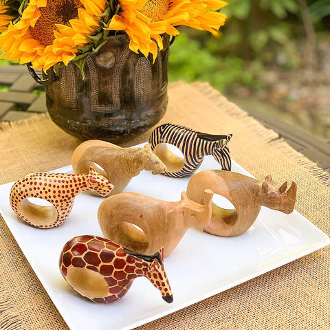 Global Crafts mahogany napkin ring Rhinoceros with earthy tones for natural-inspired table setting.