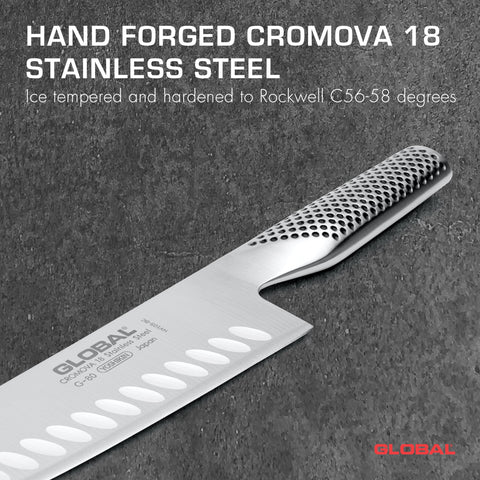 Global Santoku Knife hollow-ground edge enabling smooth, even slices of vegetables.