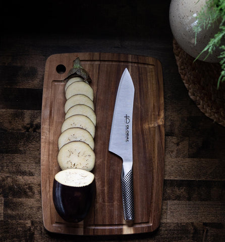 Global knife with slip-resistant grip stays secure during slicing.