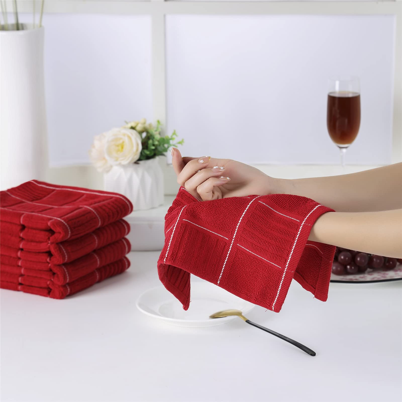 Glynniss kitchen set complements any color scheme with a vibrant red accent.