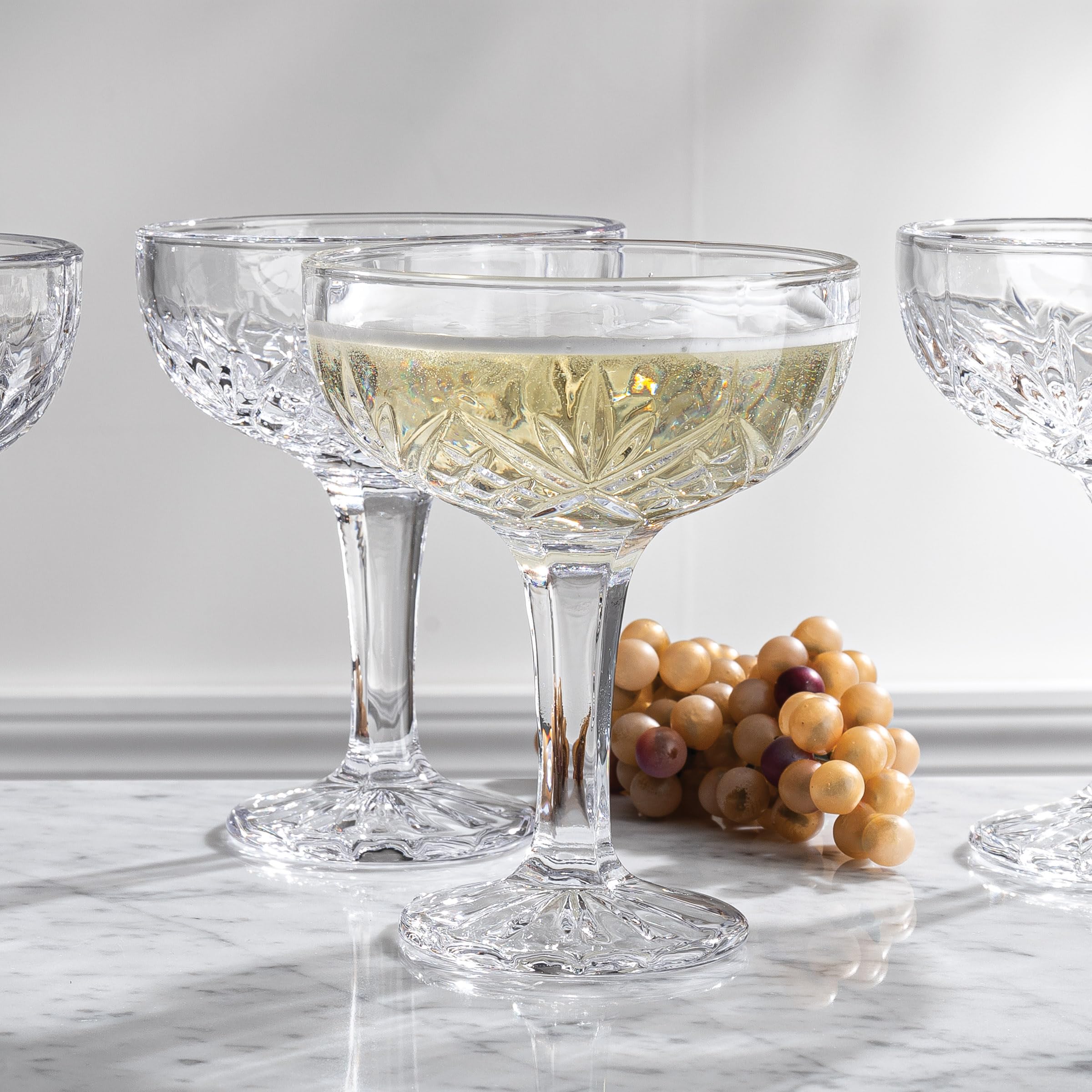 Godinger Dublin Crystal set held in hand to demonstrate 6oz capacity