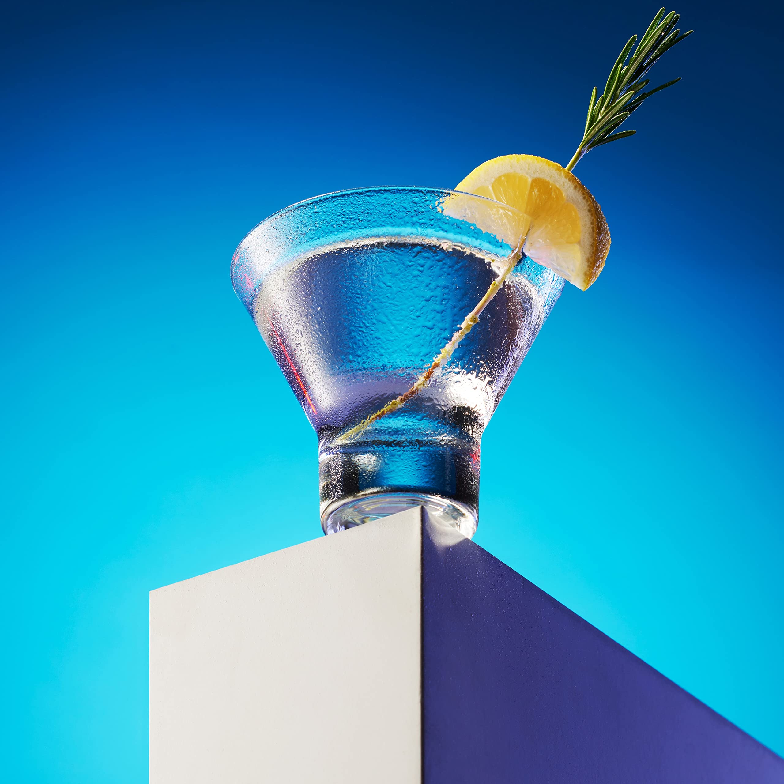 Godinger martini glass with sturdy base ensures stability during use.