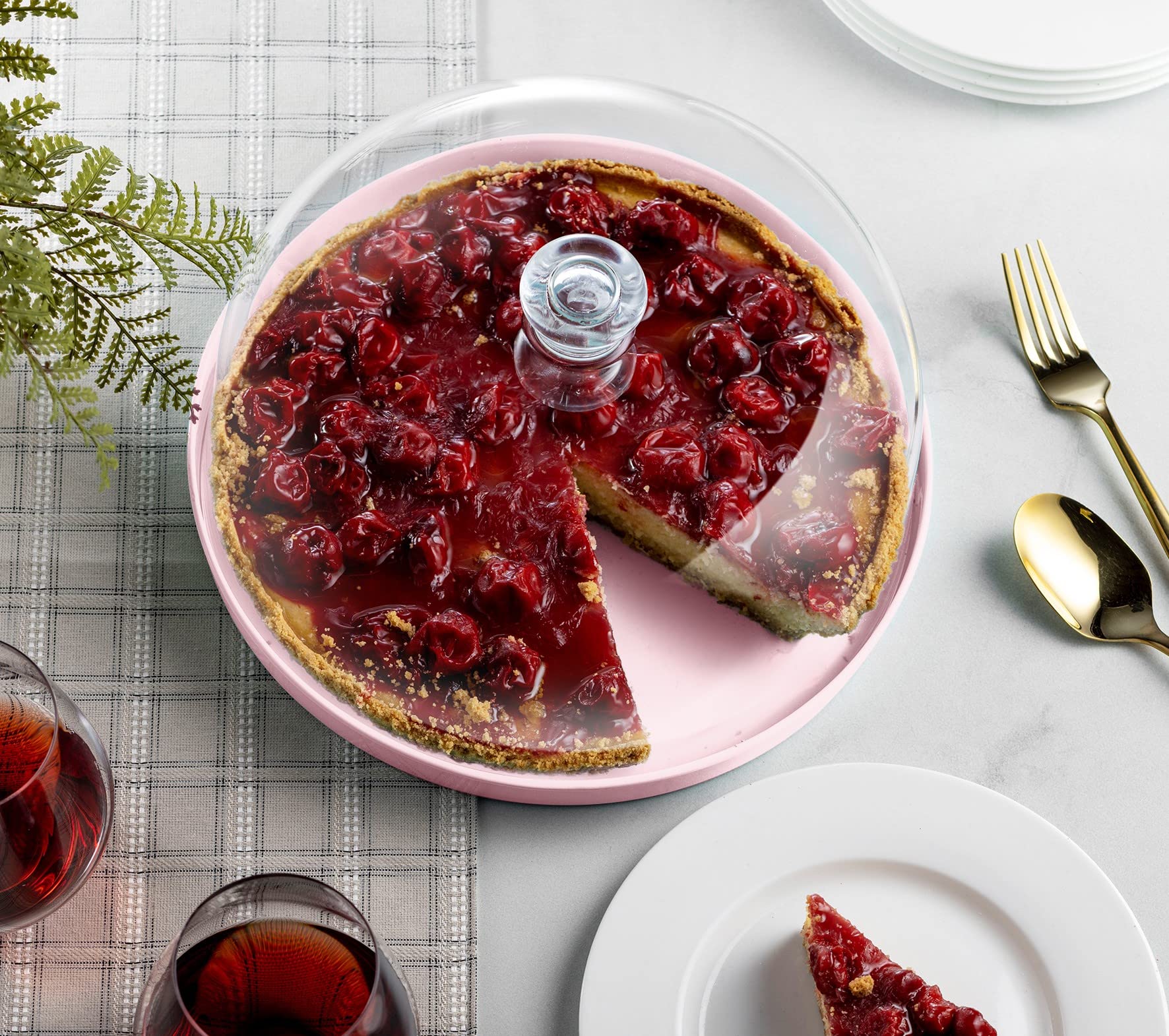 Godinger shatterproof acrylic dome protects foods indoors or outdoors.
