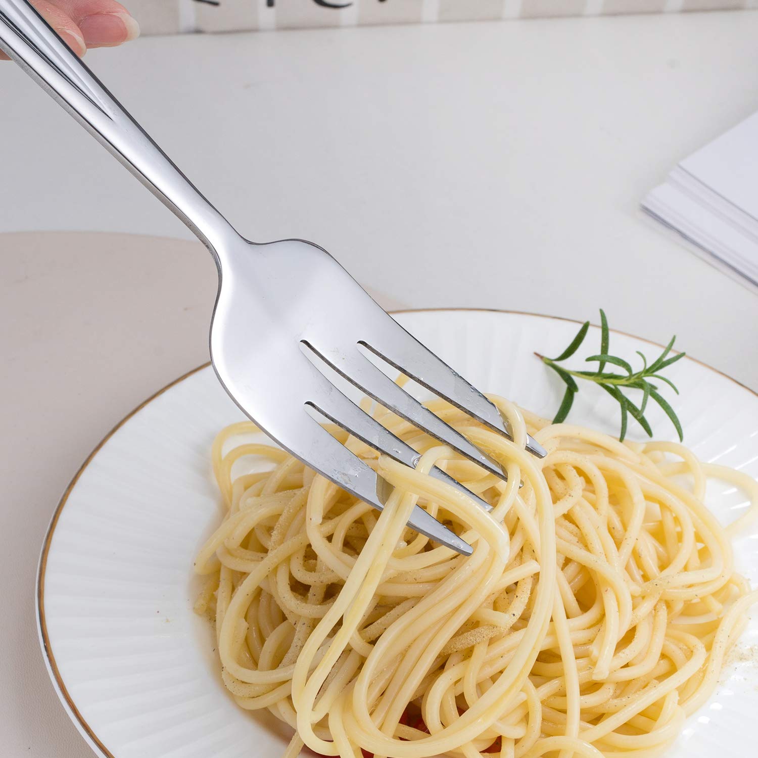 GoGeiLi 9.5-inch serving spoon with elegant weight and balance for easy serving.