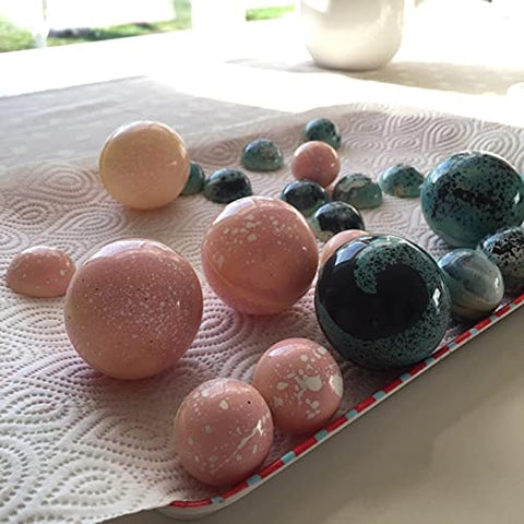 Goldbaking ball mold filled with tempered chocolate for smooth release