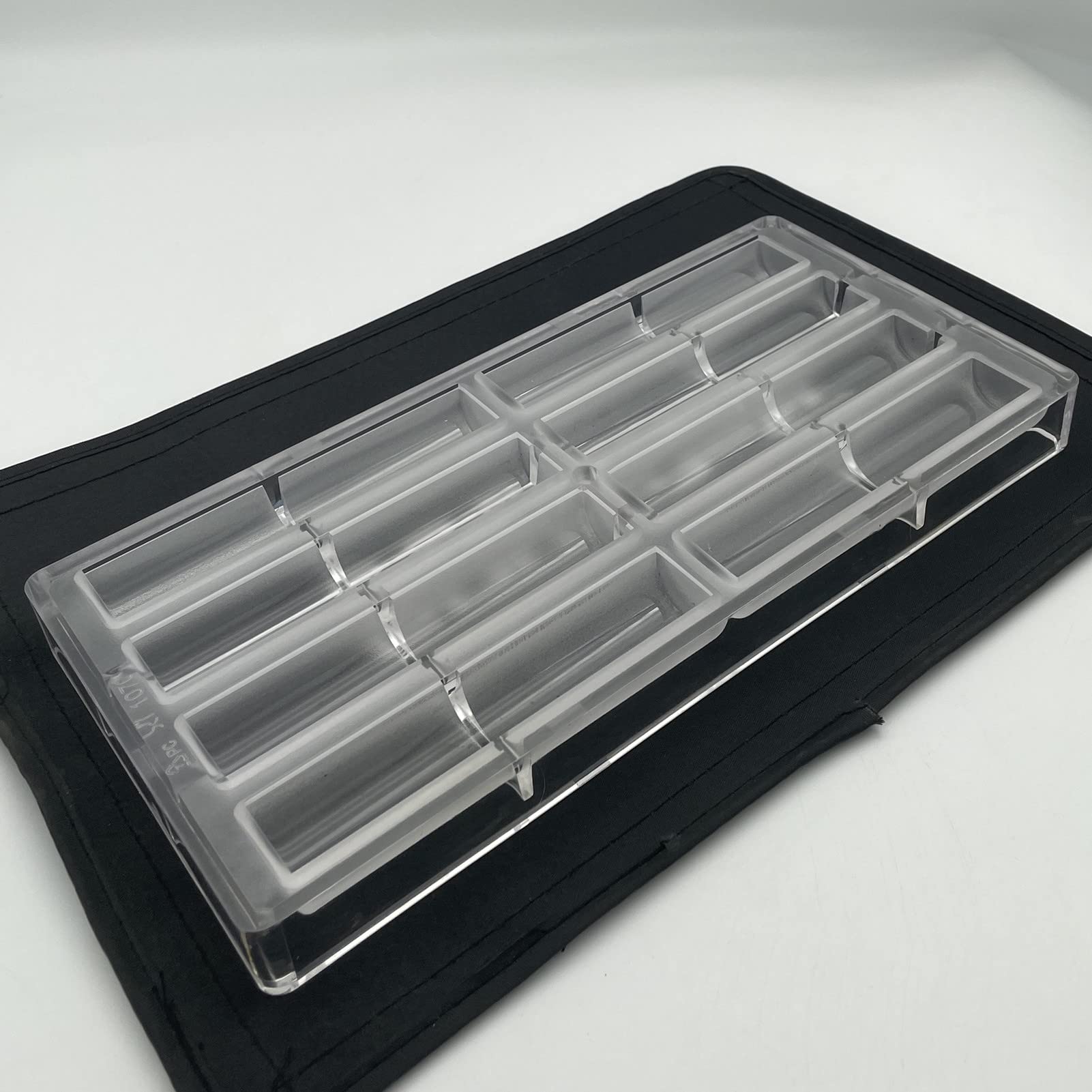 Goldbaking cylindrical shell chocolate mould forms create uniform sticks for desserts.