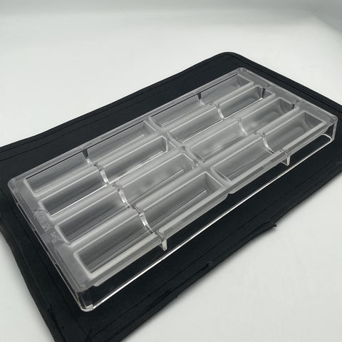 Goldbaking cylindrical shell chocolate mould forms create uniform sticks for desserts.