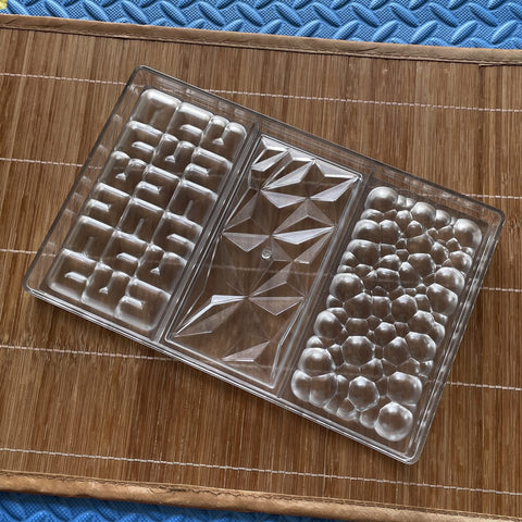 Goldbaking polycarbonate chocolate mold used for glossy, professional-looking bars.