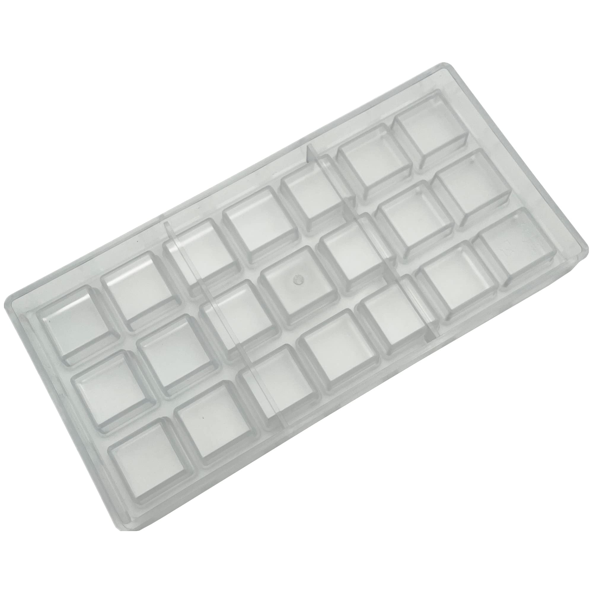 Goldbaking square chocolate mold chilling in the fridge for glossy pieces.