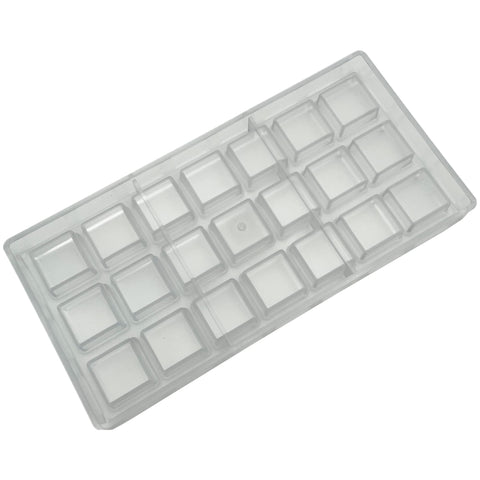Goldbaking square chocolate mold chilling in the fridge for glossy pieces.