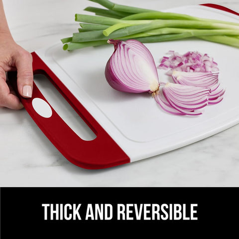 GORILLA GRIP dishwasher-safe red board for quick cleanup after meals.