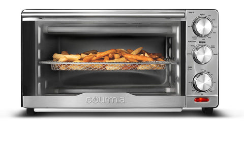 Gourmia GTF7350 6-in-1 air fryer oven in action, showcasing versatile cooking.