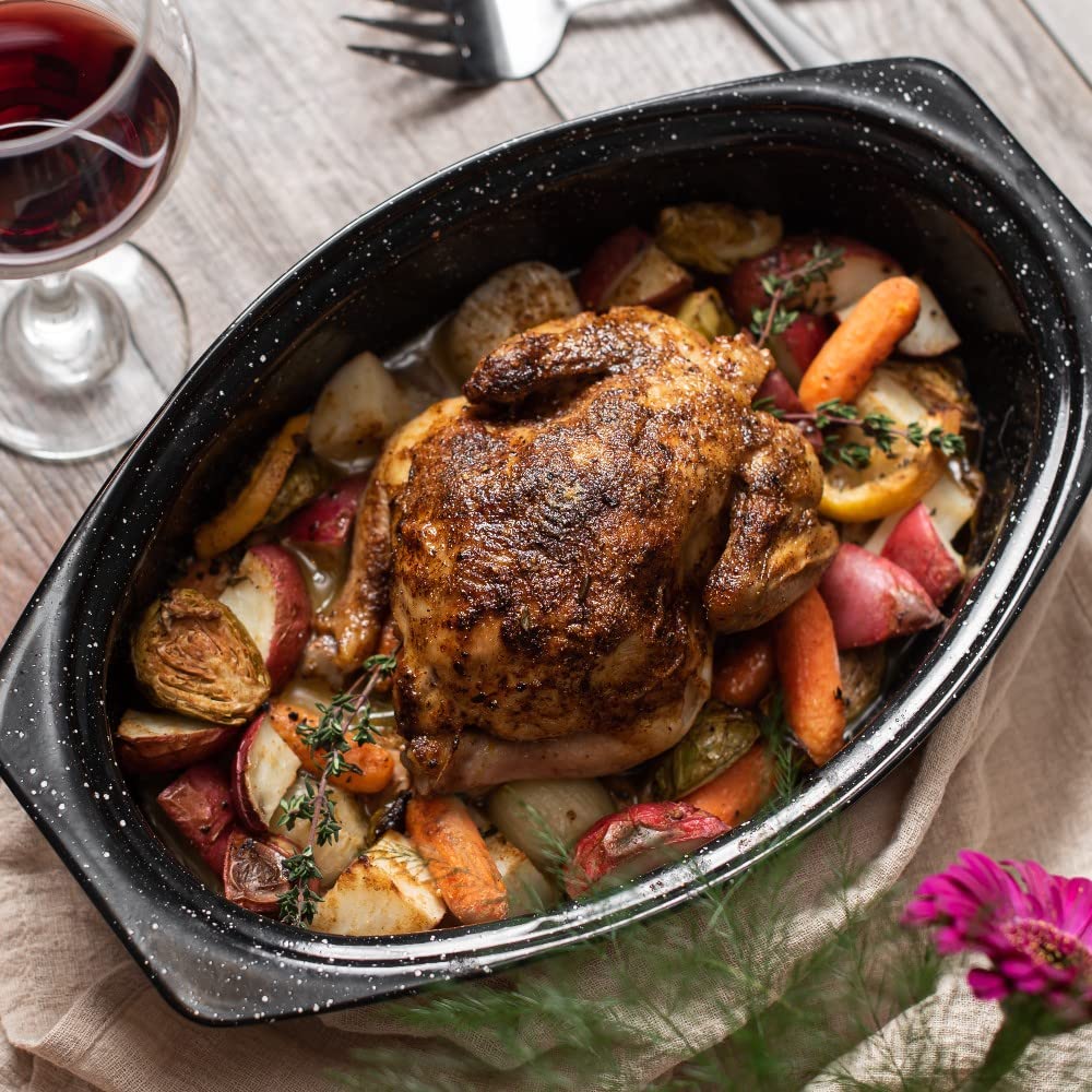 Granite Ware roaster surrounds vegetables for even roasting