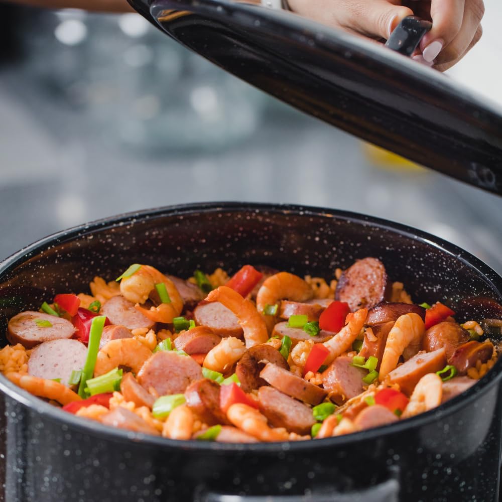 Granite Ware stock pot features non-stick ceramic finish for easy release.