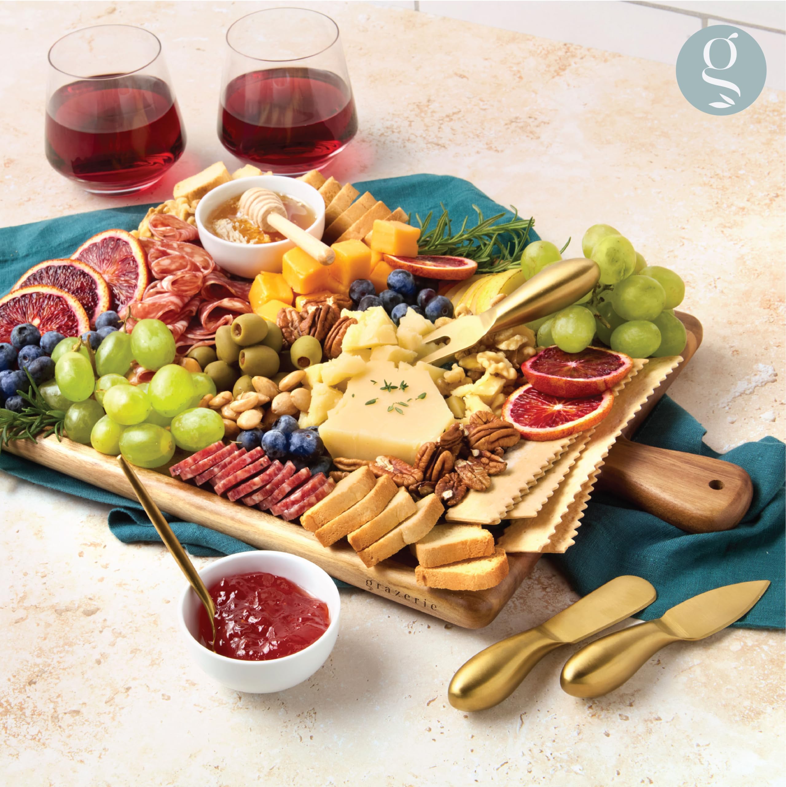 Grazerie hand-held charcuterie board designed for easy transport and outdoor entertaining
