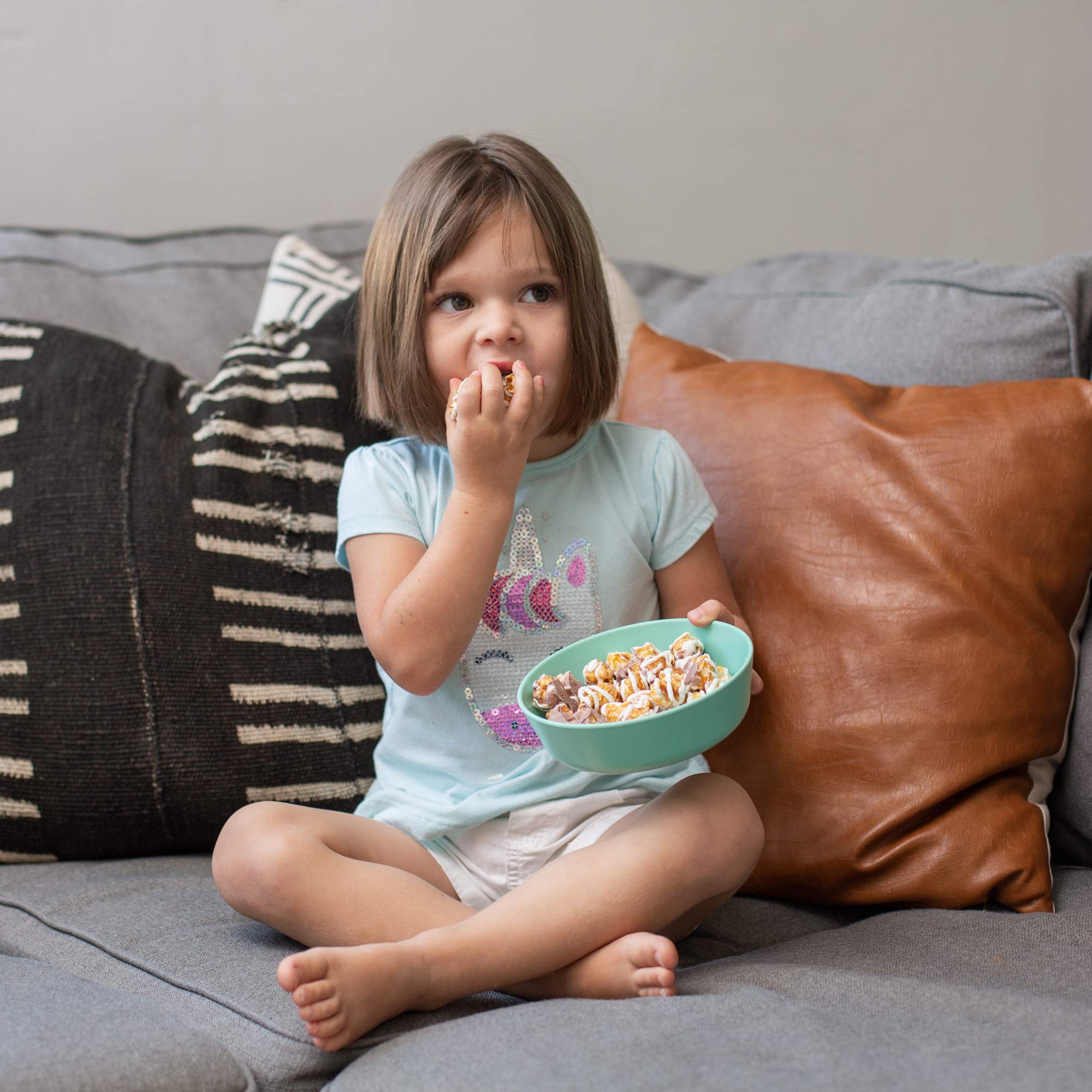 Grow Forward bamboo plates with a high lip design for self-feeding support