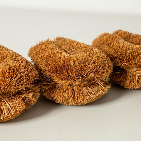 GrowByCoco Tawashi coconut coir bristles tackle tough residue on cookware.