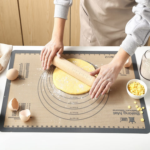 Guanci rolling macarons mat 16.5x11.6 inches for even dough rolling.