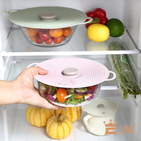GUANCI silicone lids keep food fresh in the fridge with a seal.