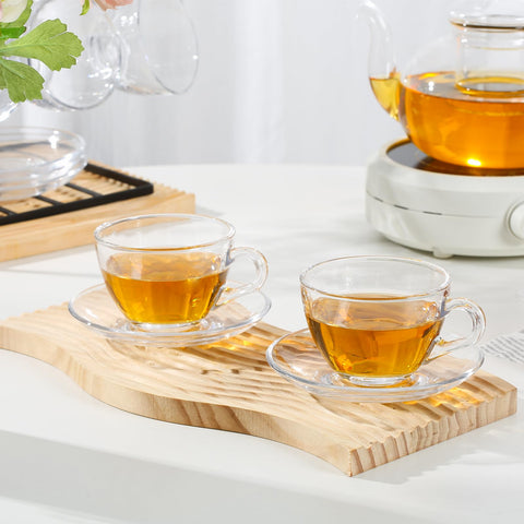 GURUDAR glass teacup with stainless spoon for easy serving.