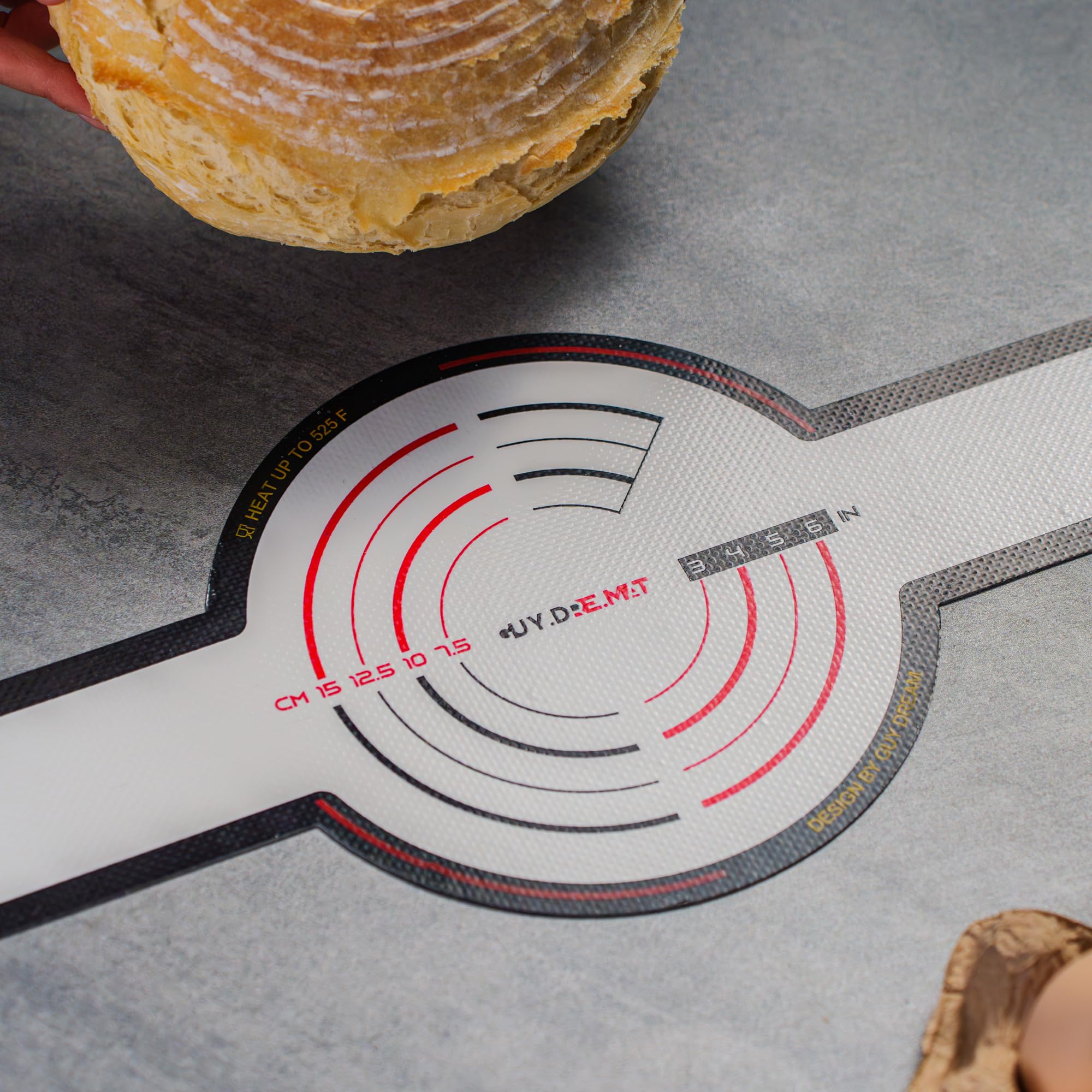 Durable GUY.DRE.MAT silicone bread sling designed for repeated baking use.