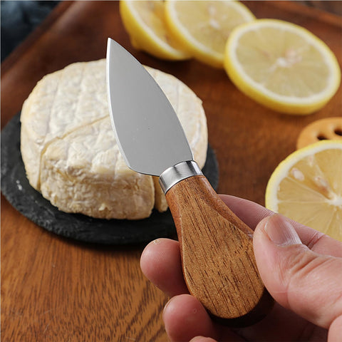 GXIQYL heart-shaped cheese knife adds playful presentation.