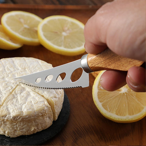 GXIQYL serving fork knife helps plate and portion cheese.