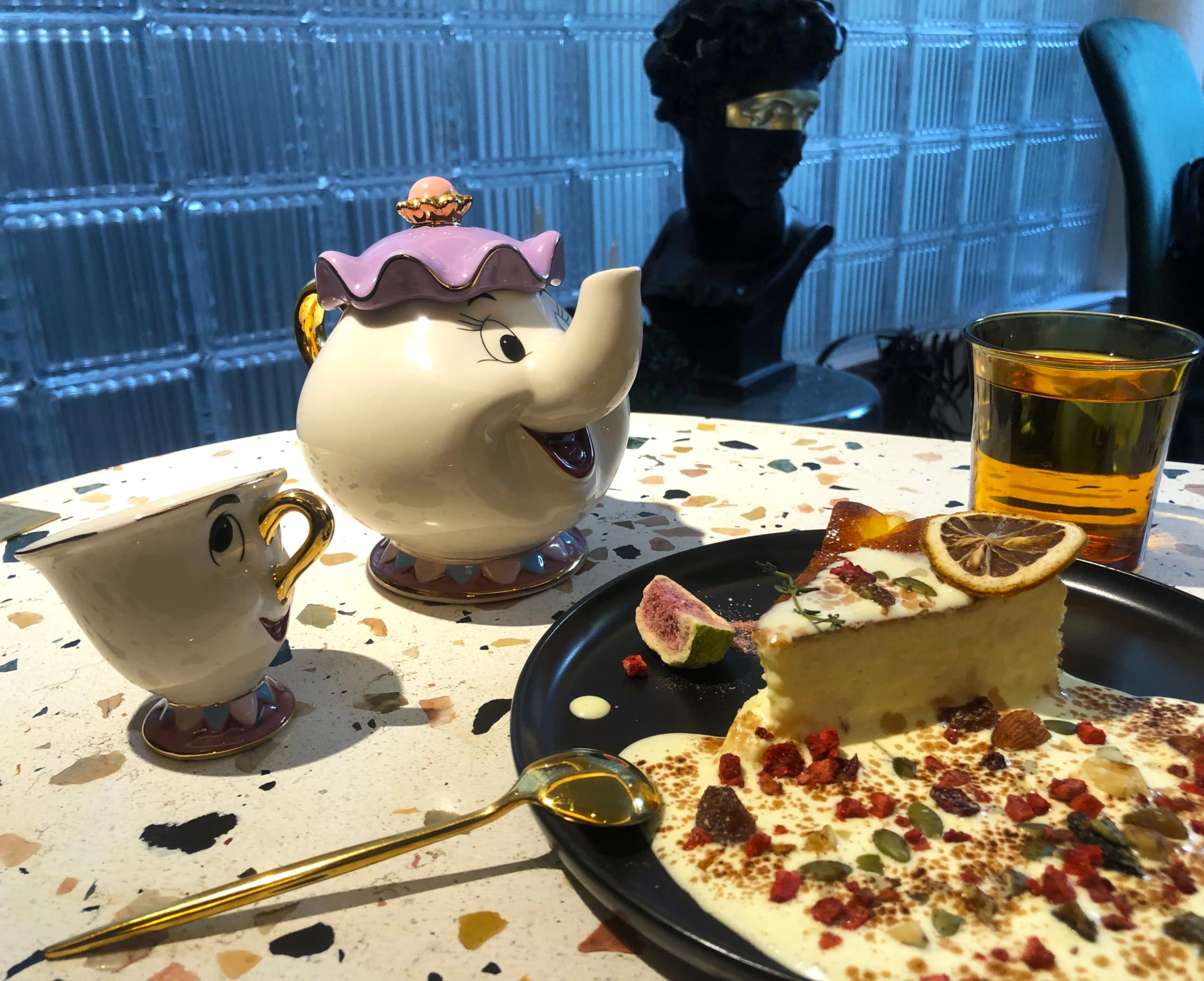 GZHaiTuoSi Mrs Potts teapot brew-ready for blooming teas.