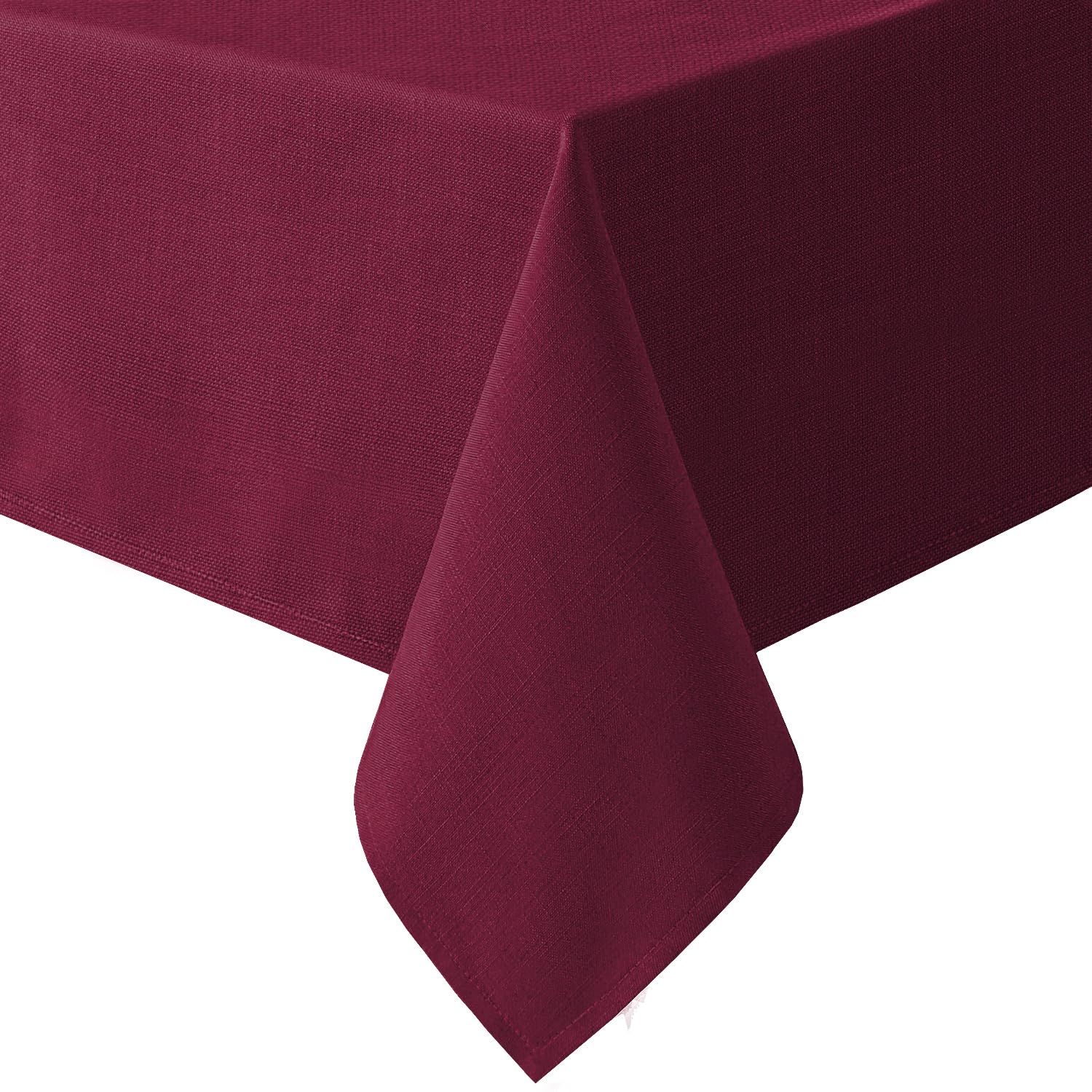 H.VERSAILTEX linen-textured tablecloth on a dining setup, offering durable protection and elegant fabric.