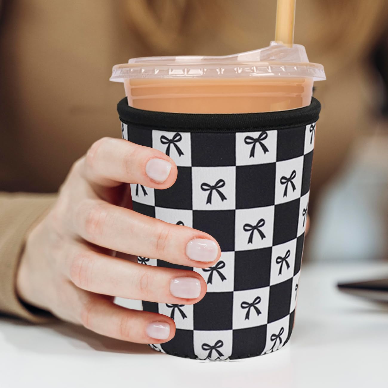 Haevola neoprene sleeve for iced coffee provides condensation control and secure grip