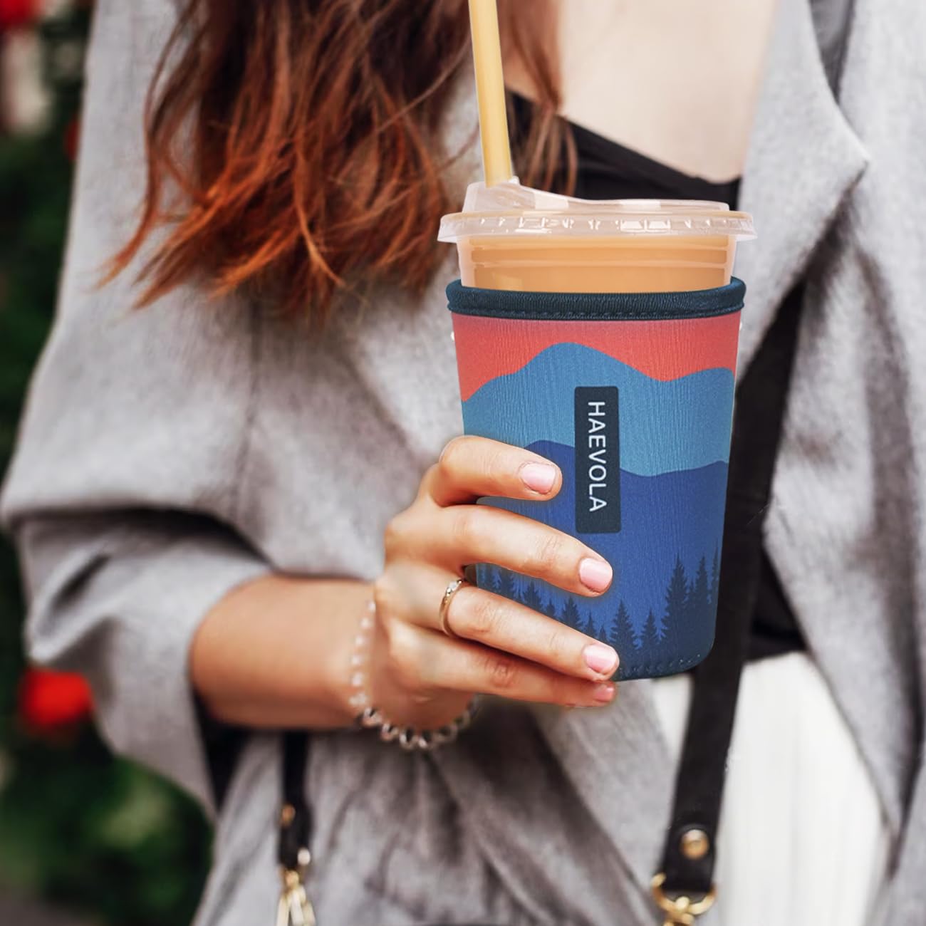 Haevola insulated neoprene sleeve preserves cold drinks while keeping hands dry.