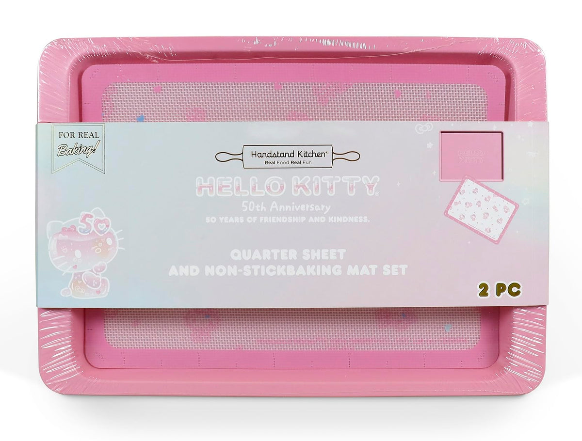 Handstand Kitchen Hello Kitty 50th baking sheet in pink for even, consistent baking.