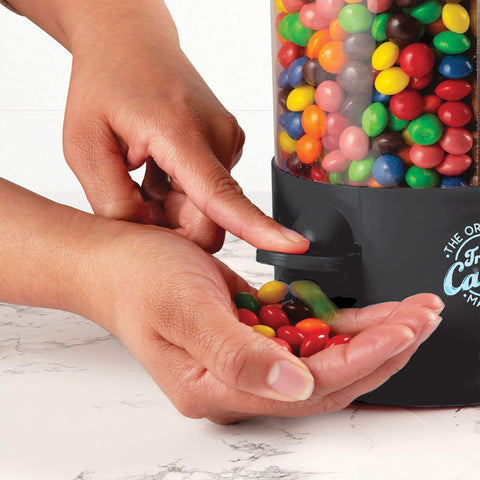 Handy Gourmet triple candy dispenser top view showing 360-degree rotation for easy access.